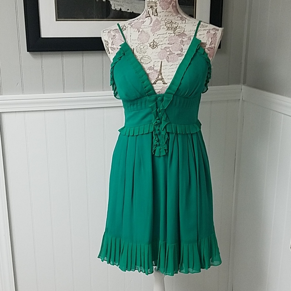 Dora Landa green dress